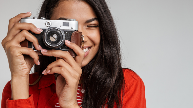 young person taking photo