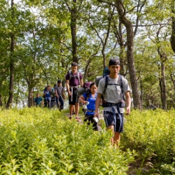 BIPOC students trek the outdoors.